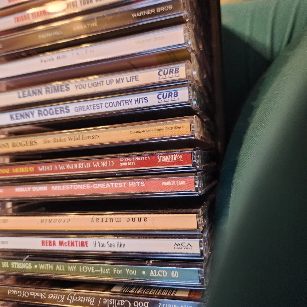 Many CD's With Black CD Storage Case